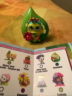 Disney Heimlich Enchanted Blooms Figure - Green with Pink Flower